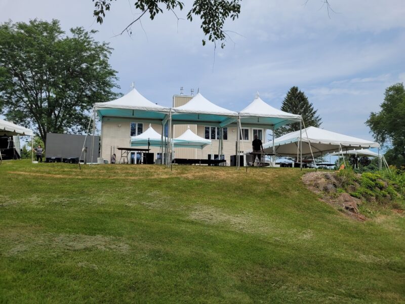 a building with tents on the side