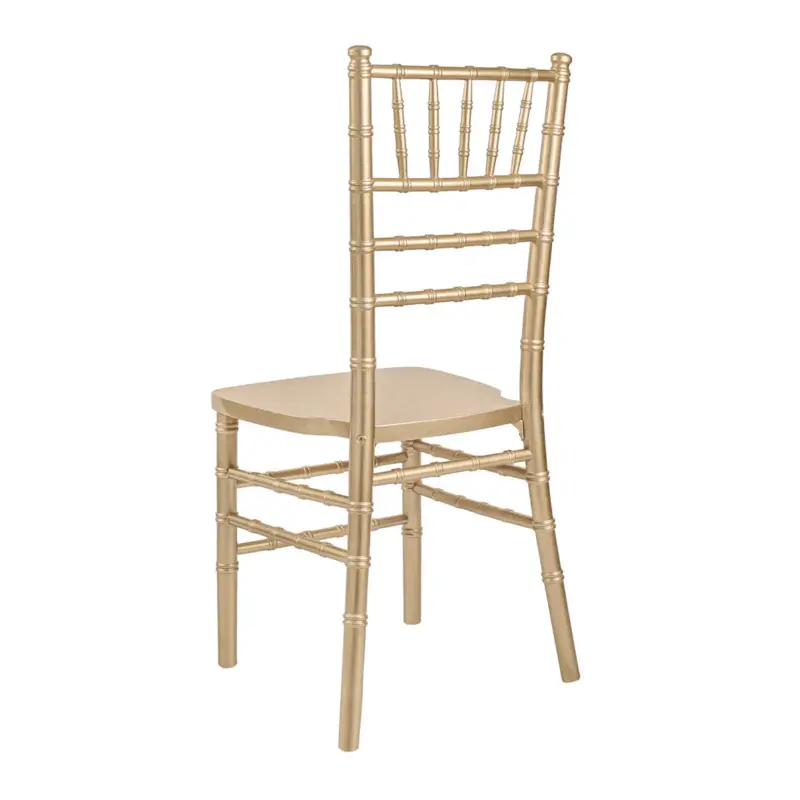 a gold chair with a white background