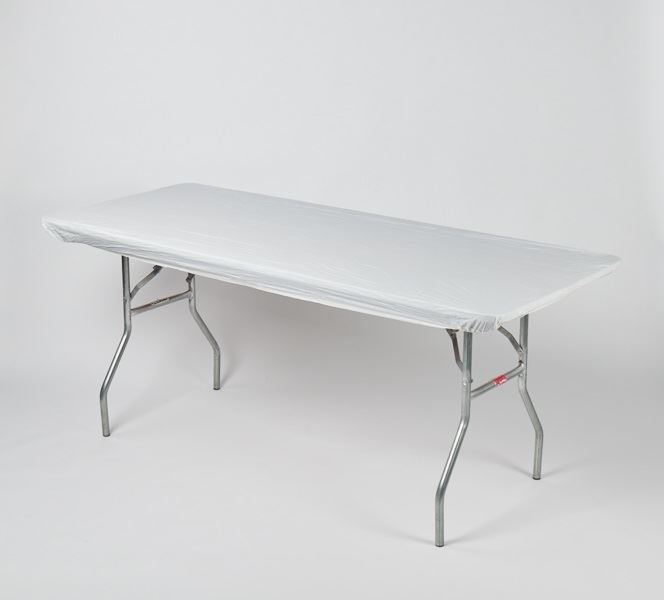 a white table with a plastic cover
