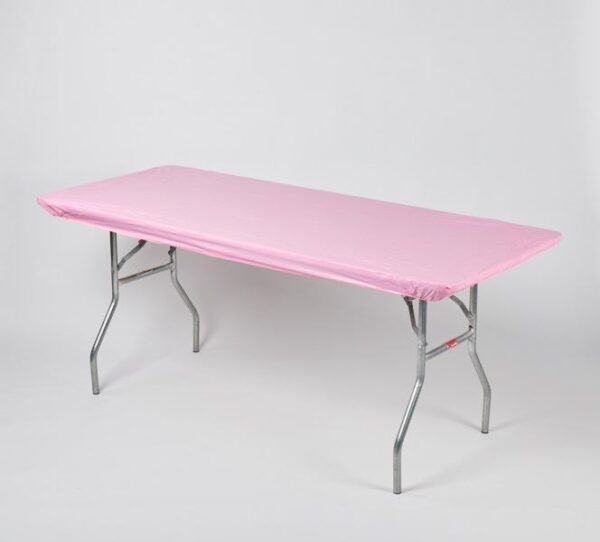 a pink table with a pink cover