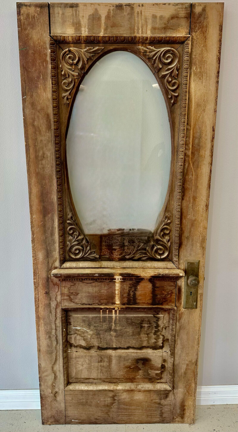 Antique Dark Brown Door W/ Oval Shaped Glass